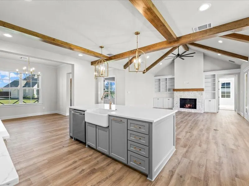 Eye-level view of a spacious open-concept living room with modern furnishings